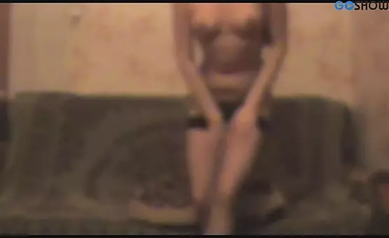 LongHaired Brunette Teasing with Stockings and Nylons